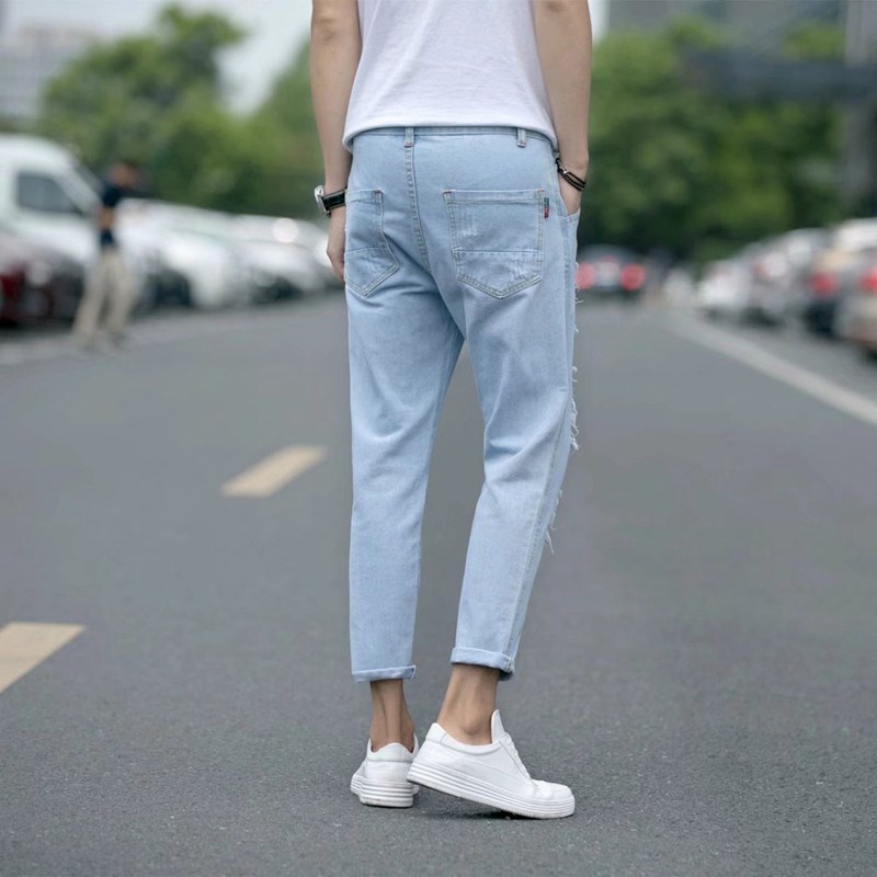 port du vent de printemps / été de la jeunesse de broyage trou blanc dans la version coréenne de joker, les hommes de neuf points jeans lavage à l'eau de manière significative les pieds minces pantalons marée port du vent de printemps / été de la jeunesse de broyage trou blanc dans la version coréenne de joker, les hommes de neuf points jeans lavage à l'eau de manière significative les pieds minces pantalons marée