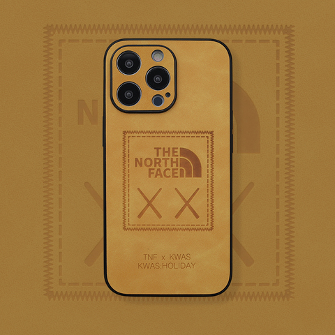 Yellow — The North Face New Kaws Non Slip Leather 14, 13, 12 iPhone Case