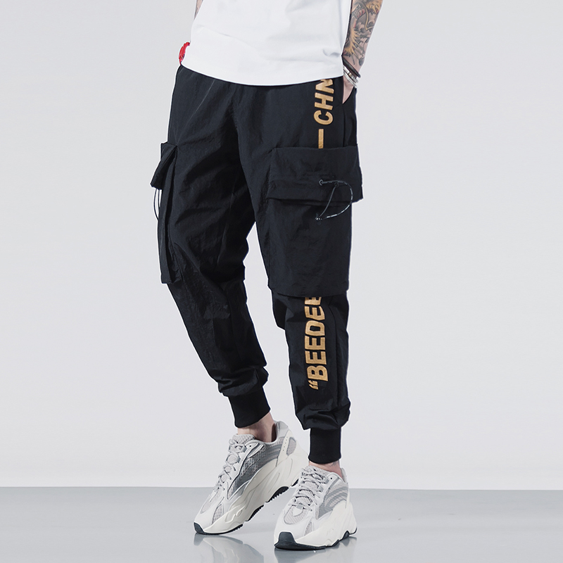 une ville âme d'été mince de loisirs faisceau pied pantalons masculins de la marée de la marque en europe et en amérique street hip-hop impression de la version coréenne des travaux d'expédition déplacer pantalon une ville âme d'été mince de loisirs faisceau pied pantalons masculins de la marée de la marque en europe et en amérique street hip-hop impression de la version coréenne des travaux d'expédition déplacer pantalon