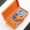 Оранжевый офисный стакан + массажный аппарат + ручка + ноутбук + чайный набор