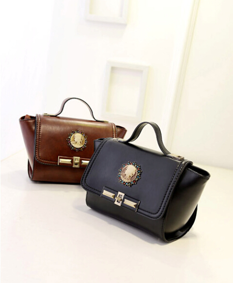 2014 new European and American fashion leather doctor bag hand diagonal bat leather handbag bag retro stereotypes swing