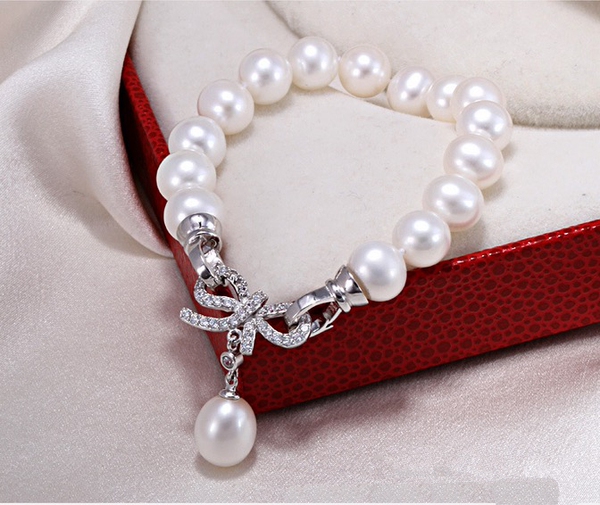 专柜爆款 天然淡水珍珠手链 强光近正圆几乎无暇 水晶蝴蝶结925银