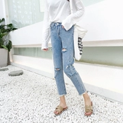 Đầu mùa xuân mới retro cá tính lỗ bất thường jeans hoang dã cao eo là mỏng chín quần phụ nữ quần thẳng triều