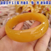 Vòng tay Ngọc bích Tân Cương Jinsi 50-65mm Phụ nữ Mở rộng Ngọc bích tự nhiên Dầu gà Vòng tay vàng Đặc biệt - Vòng đeo tay Cuff