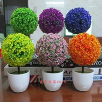 Фальшивые цветочные зеленые растения моделируют мини -растение маленькое зеленое зеленое растение