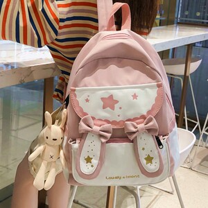 日系少女ins书包女学生韩版初中大容量背包小学生可爱卡通双肩包
