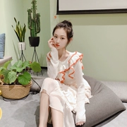 Phiên bản Hàn Quốc của chic lỏng trùm đầu màu v-cổ lưới áo len đỏ retro xù lông dài tay áo khoác nữ mùa thu