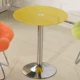 Желтый кофейный столик из стеклянного стола