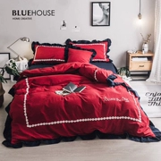 Giường mùa đông và mùa đông Bắc Âu bốn bộ bông nhuộm sợi màu đỏ cưới 1,8m đầy đủ chăn bông - Bộ đồ giường bốn mảnh