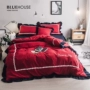 Giường mùa đông và mùa đông Bắc Âu bốn bộ bông nhuộm sợi màu đỏ cưới 1,8m đầy đủ chăn bông - Bộ đồ giường bốn mảnh chăn ga gối đệm khách sạn