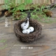 Небольшое гнездо+маленькая серая птица 1+2 яйца