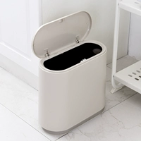 Япония прижимает мусорную банку к туалетному туалетному туалету, узкую пропасть, небольшая бумажная корзина, домашняя гостиная, есть крышка