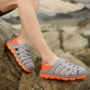 Dép nam mùa hè dép chống trượt phiên bản Hàn Quốc của xu hướng dép đi biển lỗ tổ yếm dép thoáng khí Giày lười nam giày sandal nam