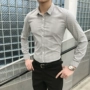 Mùa xuân hè mới áo sơ mi nam dài tay trẻ trung Phiên bản Hàn Quốc của áo sơ mi nam sọc kinh doanh - Áo áo sơ mi khoác ngoài