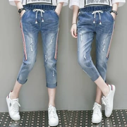 Kích thước lớn váy mùa hè 200 kg eo đàn hồi Quần jeans Tây Tạng cắt quần dài trong đoạn dài quần jean nữ giản dị - Quần jean