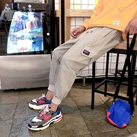 2018 mùa xuân Hàn Quốc phiên bản của xu hướng lỏng hip hop feet harem quần nam của beamed overalls nam quần thể thao quần jogger túi hộp