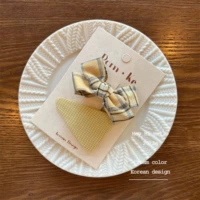 [4] Lope -grid Bow+Clip Clip Triangle