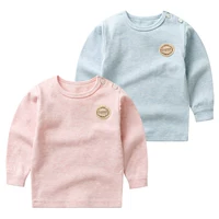 Đồ lót trẻ em cotton dài tay nữ mùa thu quần áo đơn mảnh đầu sơ sinh sơ mi tròn cổ cotton mùa xuân và mùa thu phụ kiện vali kéo