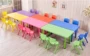 Phim hoạt hình phòng đa chức năng lớp học trẻ sơ sinh bàn ghế bốn đồ chơi bằng nhựa đồ nội thất có thể nâng trẻ em bảng bàn học chống gù cho bé gái