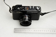 Yashica Yashica MG-1 máy quay phim với đo sáng khác nhau, điểm màu vàng tập trung 135 phim bên trục là tốt