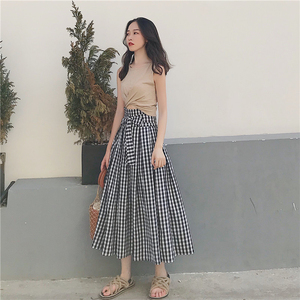 Hồng Kông hương vị retro chic máy cẩn thận chữ thập tiếp xúc rốn vest + bow cao eo kẻ sọc váy phù hợp với nữ mùa hè
