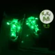 Светящиеся шнурки зеленого света пара
