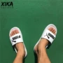 PUMA PUMA POPCAT SLIDE đôi mới màu đen và trắng thể thao dép đi biển không thấm nước 360265-12 - Giày thể thao / sandles giày sandal nam cao cấp