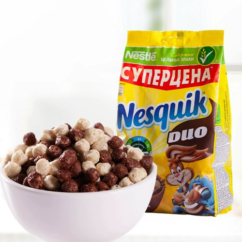 Россия импортированная еда Nestlé содержит витаминные минералы Шоколадные садовые шарики и спешную овсянку на завтрак