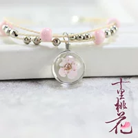 "Mười dặm hoa đào" Vòng đeo tay hoa khô vĩnh cửu Hoa thời gian Vòng tay đá quý Sen nữ Handmade dệt kim Vòng tay đào - Vòng đeo tay Clasp vòng trầm