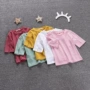 Elf cô gái bé mùa hè ngắn tay t-shirt màu rắn mỏng 0-2-3 năm tuổi cotton bé năm điểm tay áo thời trang t-shirt áo thun trẻ em xuất khẩu