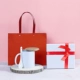 Управляйте белой чашкой изысканной подарочной коробки красной+крышка ложки