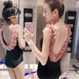 Bộ đồ bơi bé gái bikini thời trang jumpsuit áo tắm phiên bản Hàn Quốc của những cánh hoa ba chiều áo tắm backless cha mẹ-con - Đồ bơi trẻ em đồ bơi trẻ em xuất khẩu