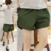 Side slit chạy quần short nam ba quần lỏng lẻo quần short thể dục bình thường hoang dã 3 điểm siêu quần short - Quần thể thao quần dù thể thao Quần thể thao