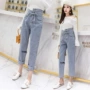 2018 thu đông mới Hàn Quốc giản dị quần jeans lưng cao nữ thời trang cà vạt mỏng lỗ chín quần thủy triều quần áo nữ giá rẻ