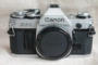 Màu sắc tốt Canon AE-1 AE-1P máy đơn có thể được trang bị máy quay phim đầu để gửi pin thực sự bắn bản đồ nhiều máy ảnh compact
