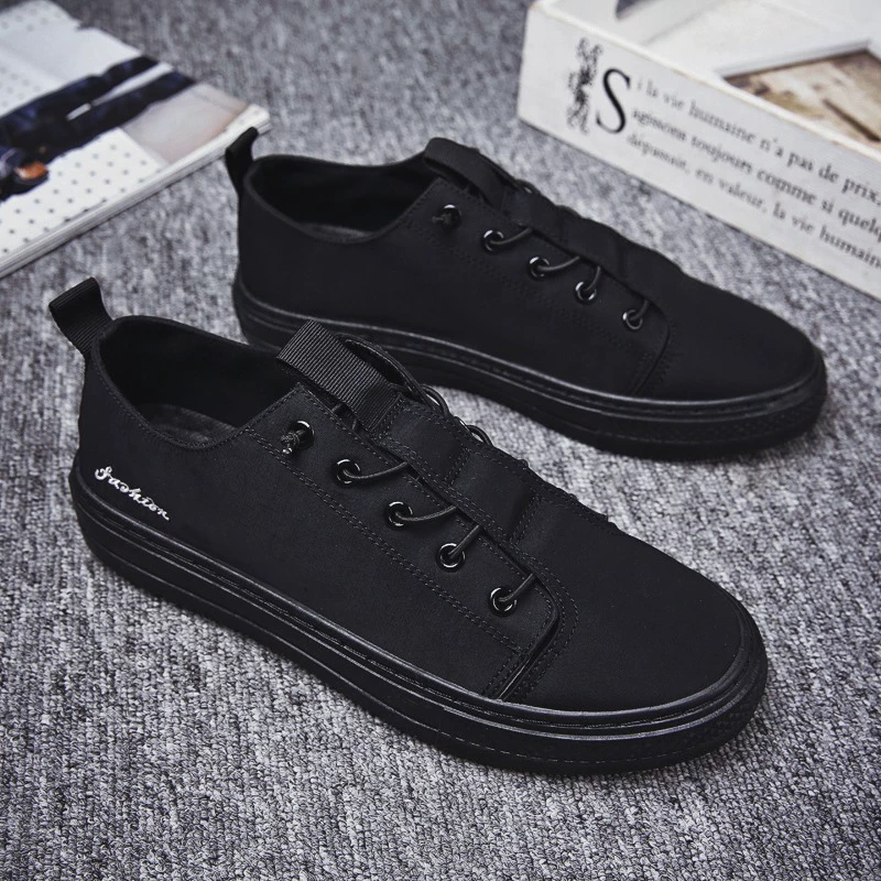 Mùa hè thoáng khí Giày đen Hàn Quốc cho nam tất cả màu đen Giày vải thông thường Giày nam màu đen thuần công sở - Plimsolls