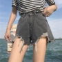 Thời trang hoang dã không thường xuyên tua quần cao đẳng gió nóng quần nữ mỏng mỏng cao eo nguyên quần short denim thủy triều quần jean nữ ngắn
