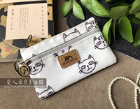 Маленькая белая кошка