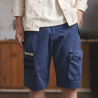 Madden dụng cụ phong cách Nhật Bản Ami, túi lớn năm điểm yếm cổ điển giản dị hoang dã quần short màu xanh quần baggy nam