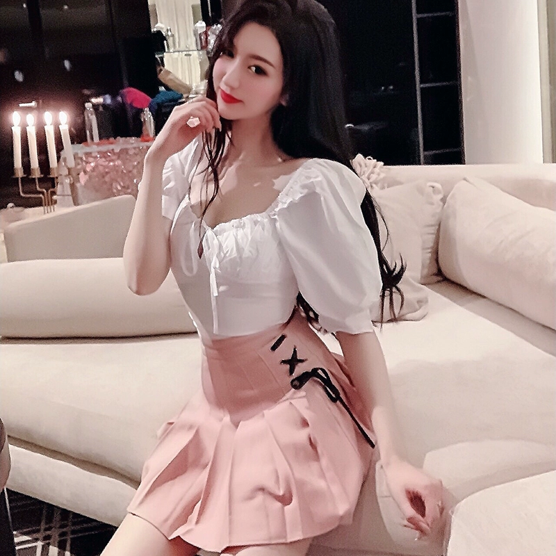 Shouyin nô lệ váy mùa hè 2019 thời trang nữ phong cách nước ngoài cà vạt màu hồng váy học sinh eo cao xếp ly váy ngắn - Váy