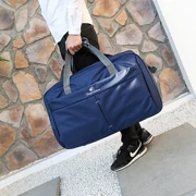 Túi du lịch xách tay công suất lớn túi duffel không thấm nước túi nam và nữ túi du lịch có thể được đặt của xe đẩy túi du lịch túi lớn túi di chuyển