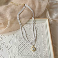 Элегантное ретро брендовое ожерелье из жемчуга, небольшая дизайнерская цепочка до ключиц, французский стиль, популярно в интернете, простой и элегантный дизайн