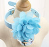 Three dimensional small bell, azure choker, flowered