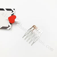 Серебряная пять -зубчатая расческа