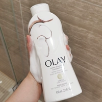 Olay, осветляющий увлажняющий гель для душа содержит никотиновую кислоту, американская версия, кокосовое молоко, 650 мл