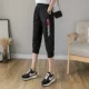 Черные брюки KZ394 белые клетки