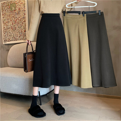 taobao agent Black colored fitted demi-season pleated skirt, woolen umbrella, plus size, for pear shaped body, A-line