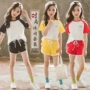 Quần áo trẻ em mùa hè 2019 cho bé gái Áo thun ngắn tay + quần short phù hợp với quần áo thể thao nữ hai mảnh dành cho phụ nữ - Trang phục dành cho cha mẹ và con quần áo gia đình đẹp