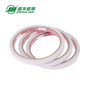 Jinghua 0.9cm 10Y băng keo hai mặt Red Lion độ nhớt hai mặt Băng keo văn phòng sinh viên Băng keo hai mặt - Băng keo