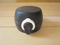 Bai Qiao Black Lid